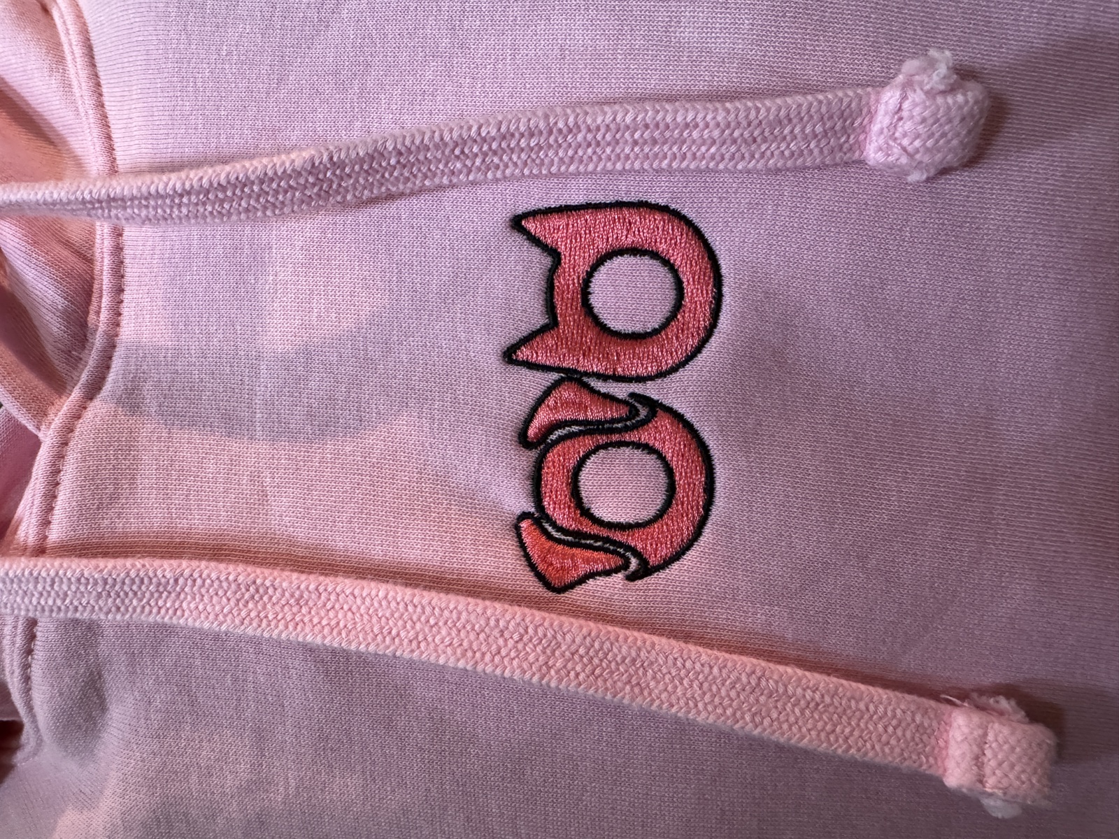 Sudadera rosa de Zooasis con logo bordado en relieve